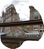 Homeowner hoisting furniture up to apartment